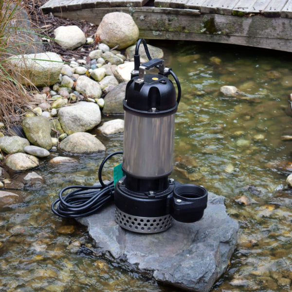EasyPro TM Series Submersible Pond Pump With Rocky Garden Stream Flowing Under Bridge
