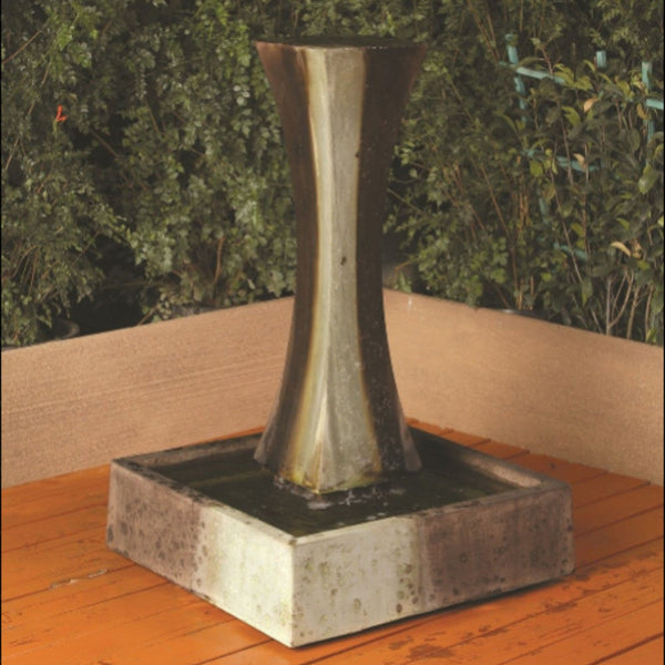Gist Mini I Garden Water Fountain With Green Plants In The Background