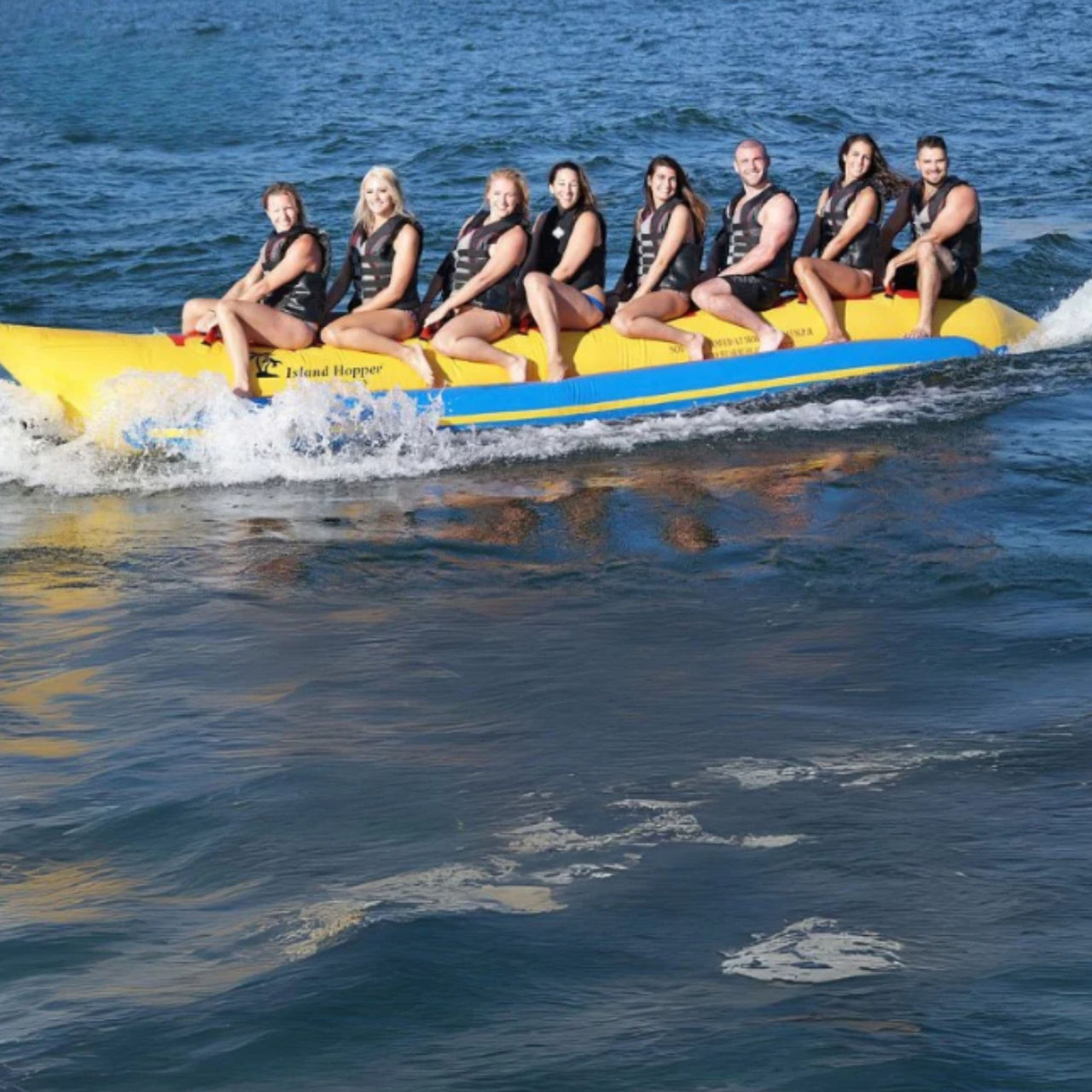 Island Hopper Elite Class 8 Person Banana Boat With A Group Having Fun And Excited For A Ride