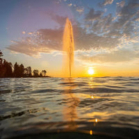 Thumbnail for Kasco J Series Fountain On The Water At Sunset With Trees In The Background