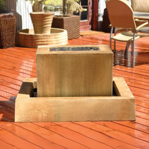 Linear Garden Water Fountain By Gist With Chairs And Planters In The Background