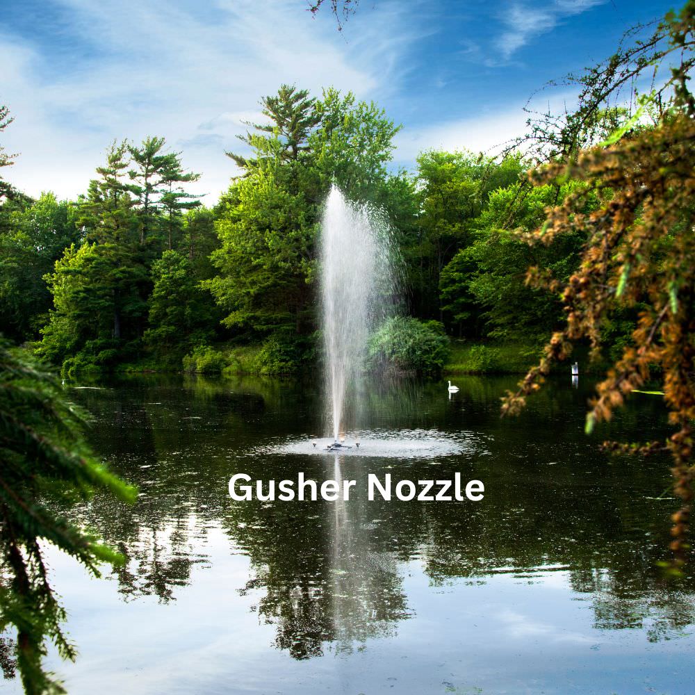 Scott Aerator Triad Pond Fountain With Gusher Nozzle On The Water With Trees In The Background