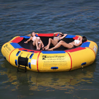 Thumbnail for 13 Island Hopper Bouncer and Splash Three Ladies Lying Down While Sunbathing on the Bouncer in Calm Water