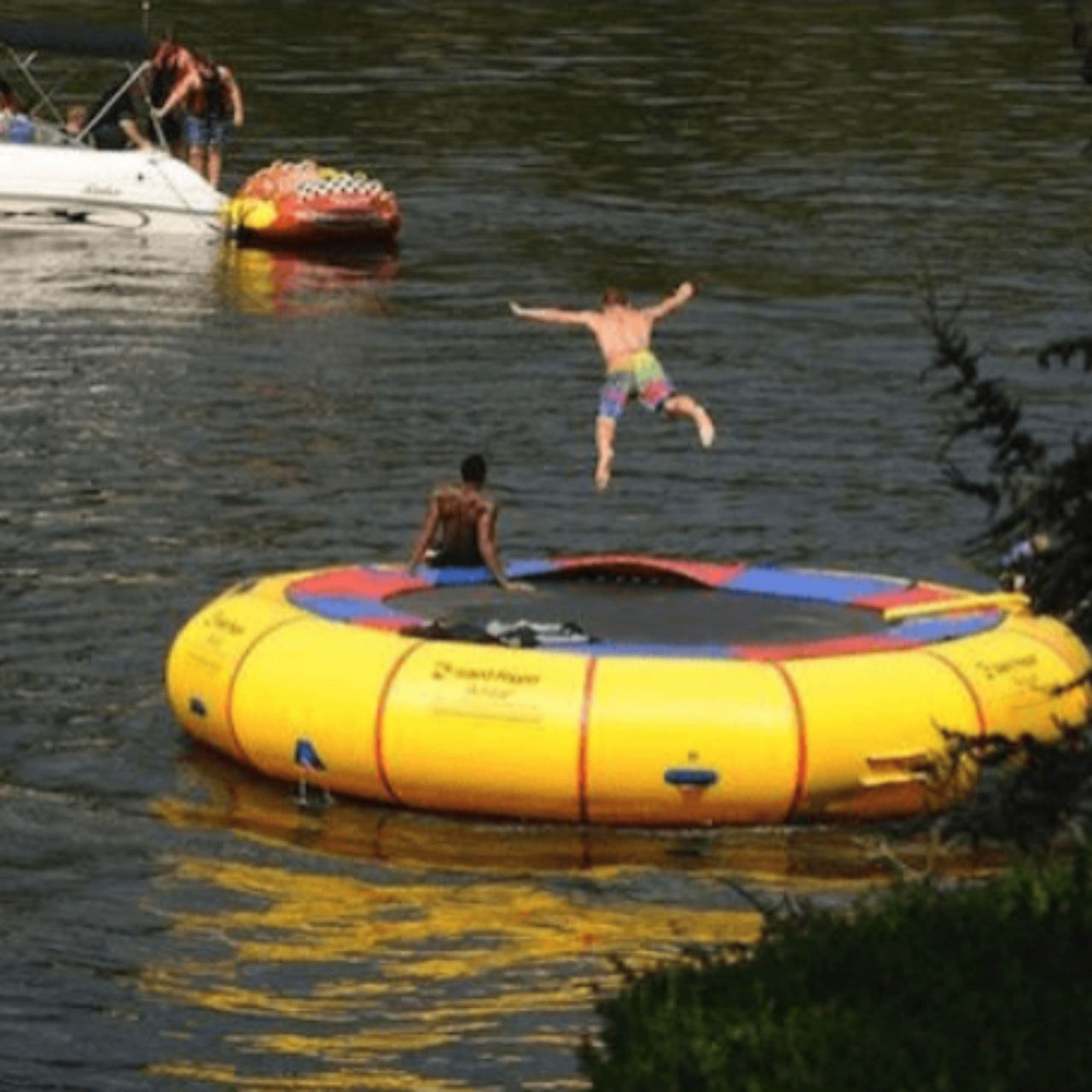 20 Island Hopper Water Trampoline With A Man Jumping Into Water