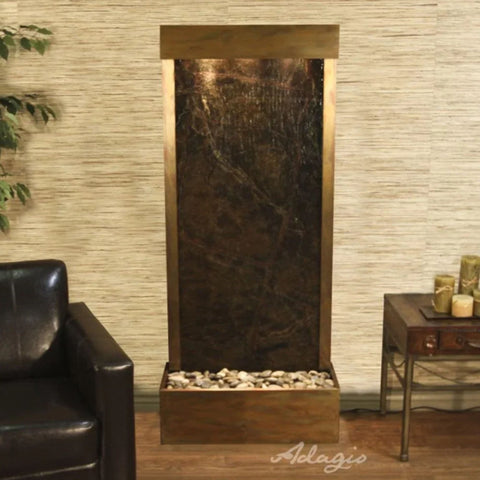 Adagio Harmony River Floor Fountain for Home or Office Decor With Chocolate Brown Leather Chair and Candles on the Side Table