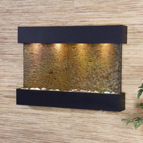 Adagio Reflection Creek Modern Wall Water Fountain With  Neutral Wall Background and Green Leaves