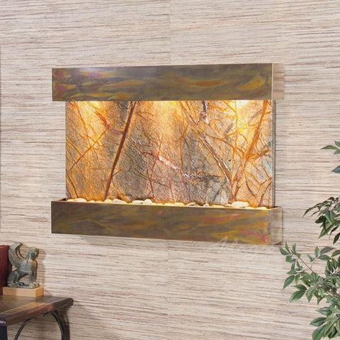 Adagio Reflection Creek Wall Fountain With Small Sculptural Decor and Green Plants