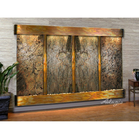 Adagio Regal Falls Wall Fountain With Green Plants and Antique Small Table