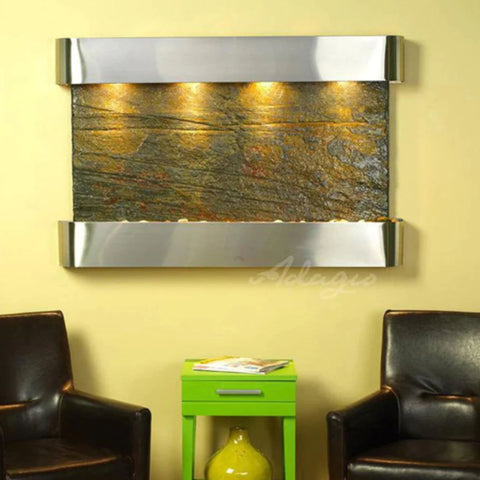 Adagio Sunrise Springs Modern Water Wall Fountain Front View With Leather Sofas and Green mall Table