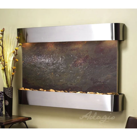 Adagio Sunrise Springs Wall Fountain Angled View With Artificial Flowers On a Vase