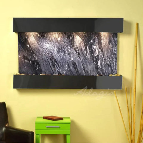 Adagio Sunrise Springs Wall Fountain With Yellow Wall and a Bamboo Sticks and Green Table