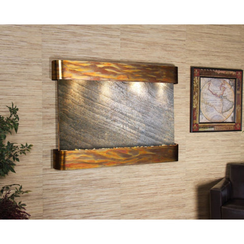 Adagio Teton Falls Wall Fountain With Textured Walls And Green Plants