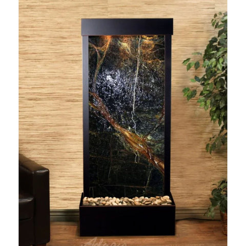 Adagio Water Features Harmony River Floor Water Fountain - Rear Mounted With Neutral Textured Background and Plants