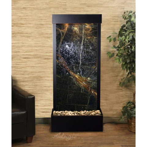 Adagio Water Features Harmony River Floor Water Fountain - Rear Mounted With Neutral Wooden Textured Background and Plants