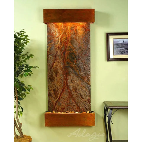 Adagio Water Features Inspiration Falls Wall Fountain With Green Accent Wall and Plants