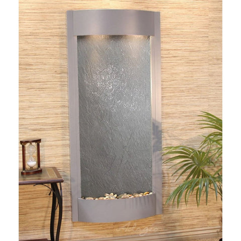 Adagio Water Features Pacifica Waters Wall Fountain With Hourlyglass Decor and Anahaw Palm Plant-Black Feather Stone-Silver Metallic