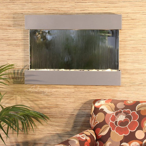 Adagio Water Features Reflection Creek Wall Fountain With Floral Design Seating and Palm Leaves