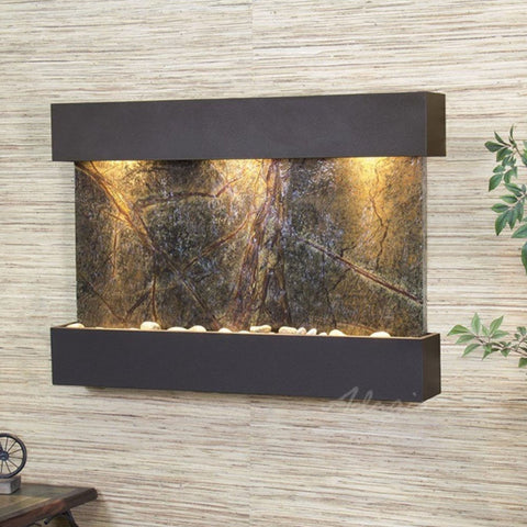 Adagio Water Features Reflection Creek Wall Fountain With Green Leaves and Small Bicycle Decor