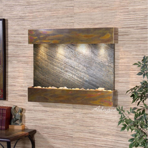 Adagio Water Features Reflection Creek Wall Fountain With Green Plants and Small Figurine Decor