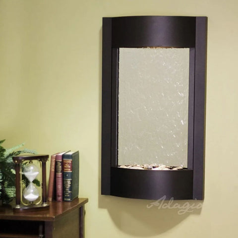 Adagio Water Features Serene Waters Wall Fountain With Books and Hourglass