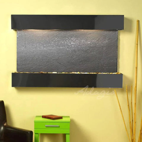 Adagio Water Features Sunrise Springs Wall Fountain With Bamboo Sticks and Small Green Table