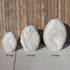 Thumbnail for Almond-Shaped Green Marble Stone Fountain Showing The Three Available Sizes With Wooden Wall Background