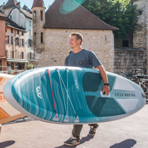 Aqua Marina Airo ISUP A Man Walking While Carrying The Board