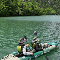 Thumbnail for Aqua Marina Caliber 398 Angler Inflatable Fishing Kayak With A Man And Woman Synchronized Paddling On Calm Water