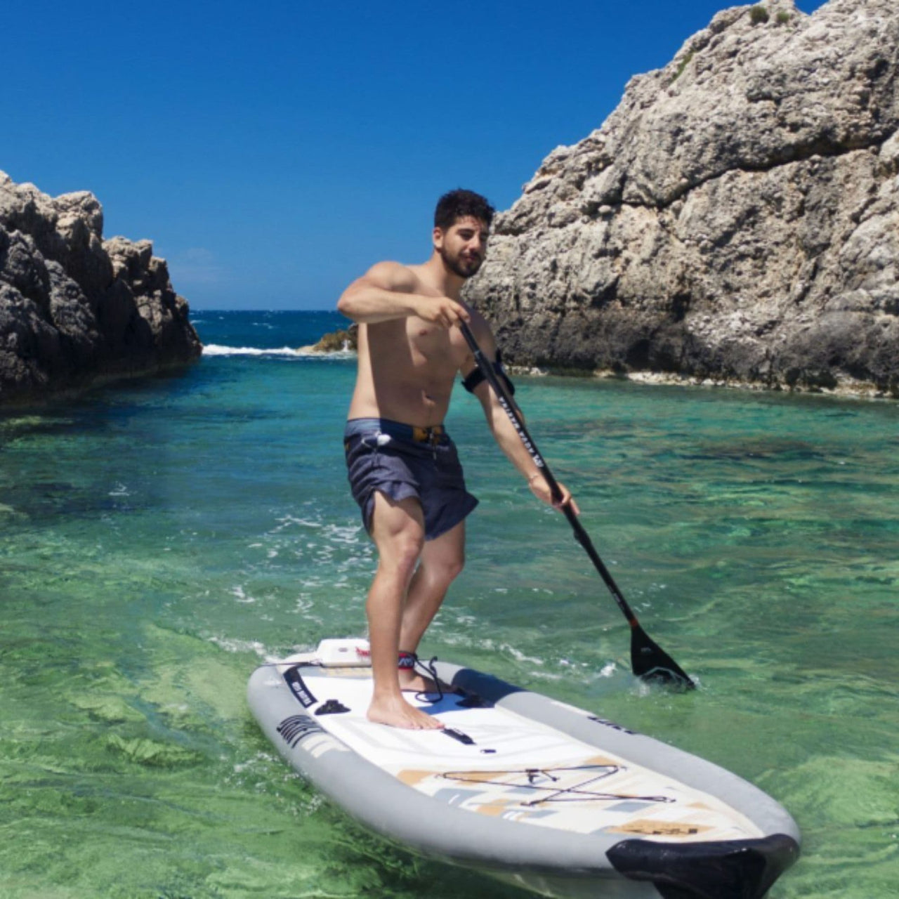Aqua Marina Drift SUP With A Man Standing While Paddling
