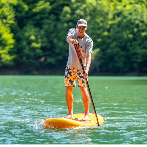 Aqua Marina Fusion Sup Board with A Man on Board Front View