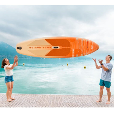 Aqua Marina Halo Inflatable SUP A Man and A Women Lifted It on Top
