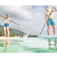 Thumbnail for Aqua Marina Halo Paddle Board A Man And A Woman Are Playing While Paddling