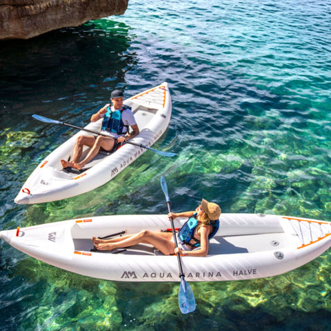 Aqua Marina Halve Kayak With A Kayaker Couple Resting At The Crystal-Clear Sea