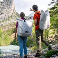 Thumbnail for Aqua Marina Halve Kayak With A Man And Woman Backpacking An Inflated Kayak