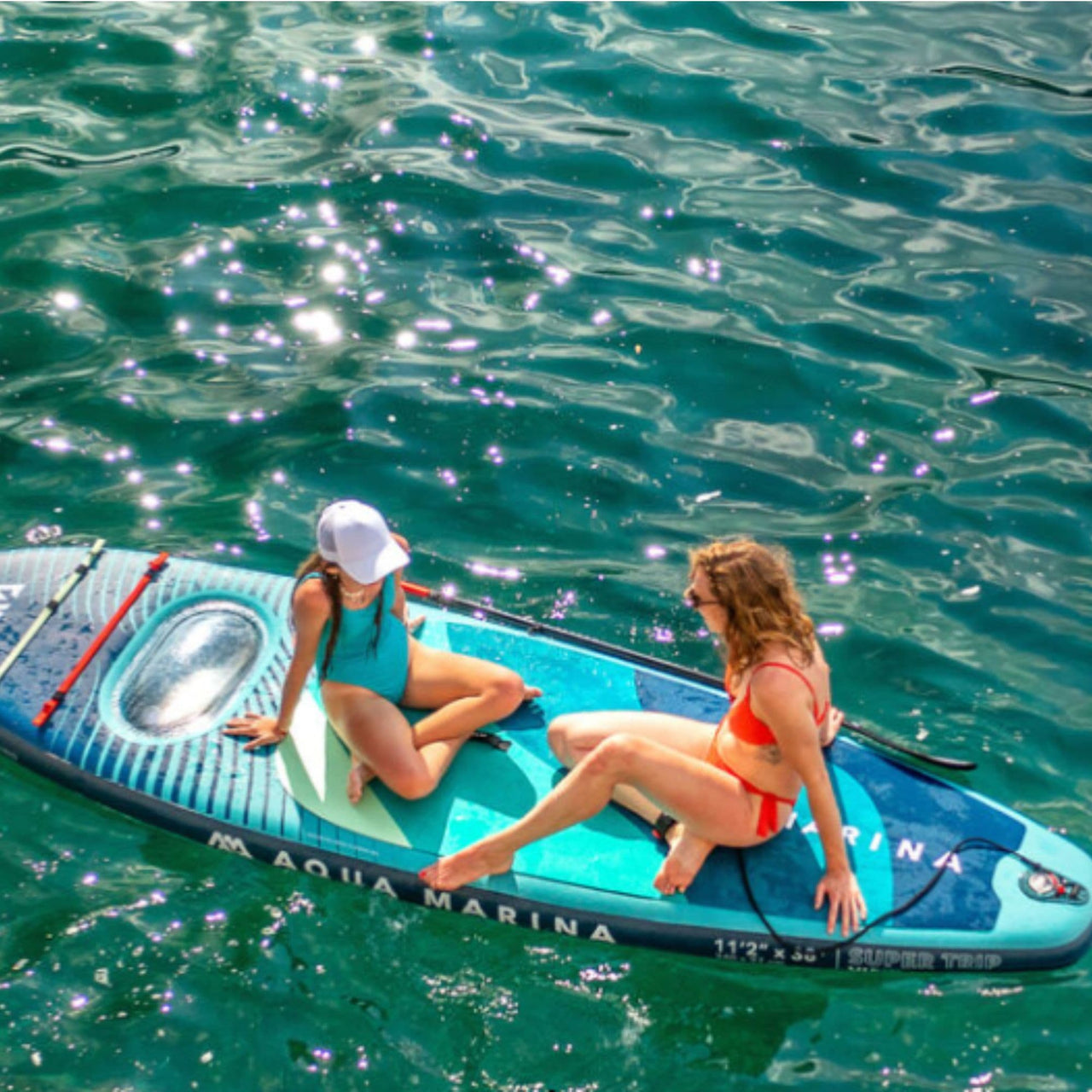 Aqua Marina Super Trip SUP Mother and Daughter Riding On The Water