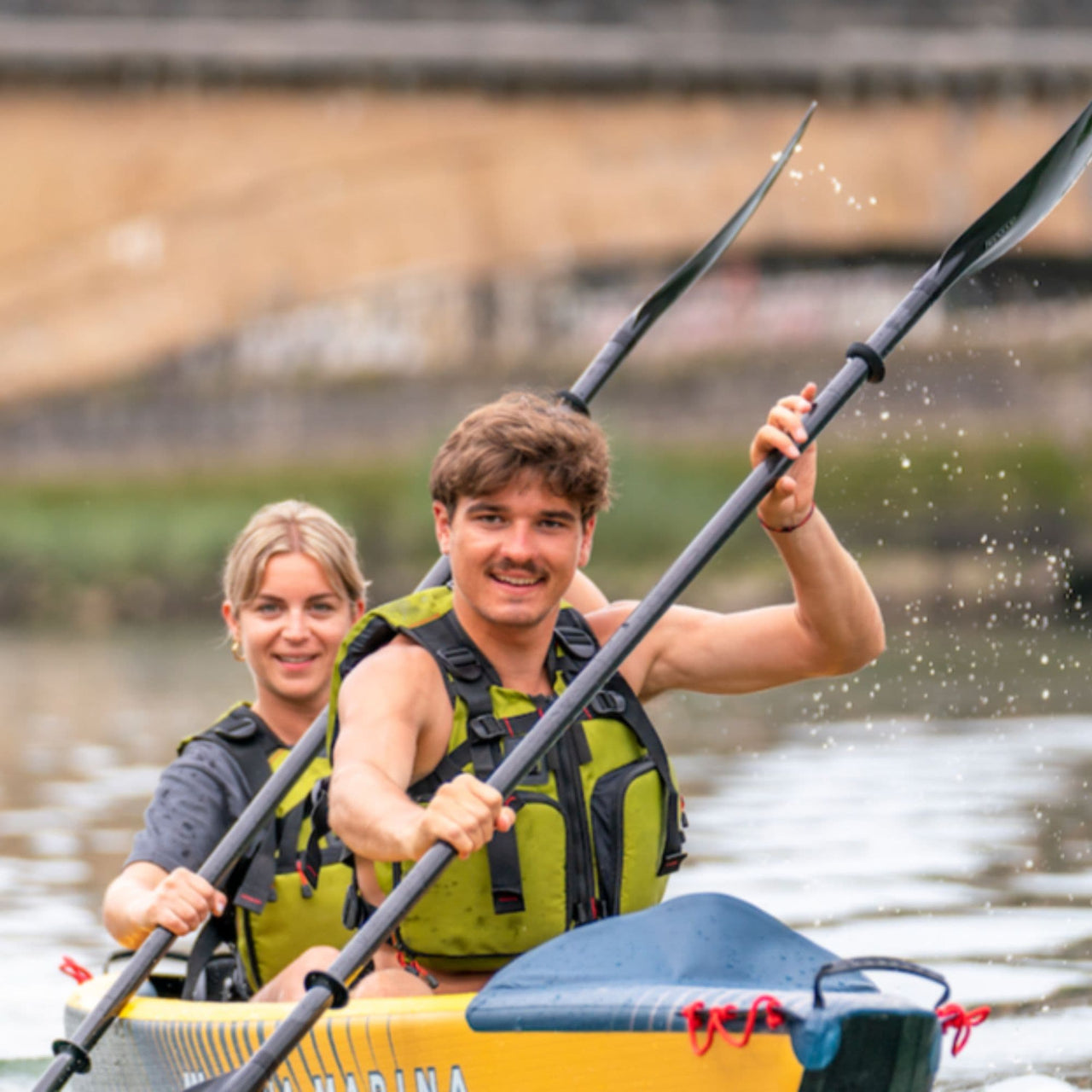 Aqua Marina Tomahawk Air-K 440 With A Man And Woman Synchronized Paddling