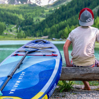 Thumbnail for Aqua Marina Vibrant Youth With a Boy Sitting By the Lake