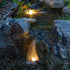 Thumbnail for Aquascape Deluxe Pondless Waterfall Kit At Night With Soft Lighting