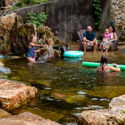 Aquascape Recreational Pond Kit 9 x 20 With Family Relaxing And Swimming