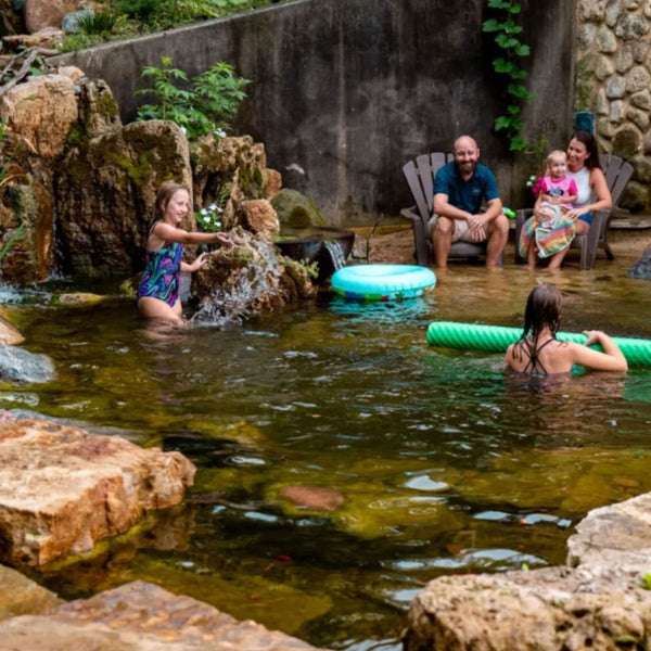Aquascape Recreational Pond Kit 9 x 20 With Family Relaxing And Swimming