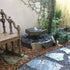 Thumbnail for Basalt Bird Bath Stone Fountain Besides The Chair, Plants And Trees