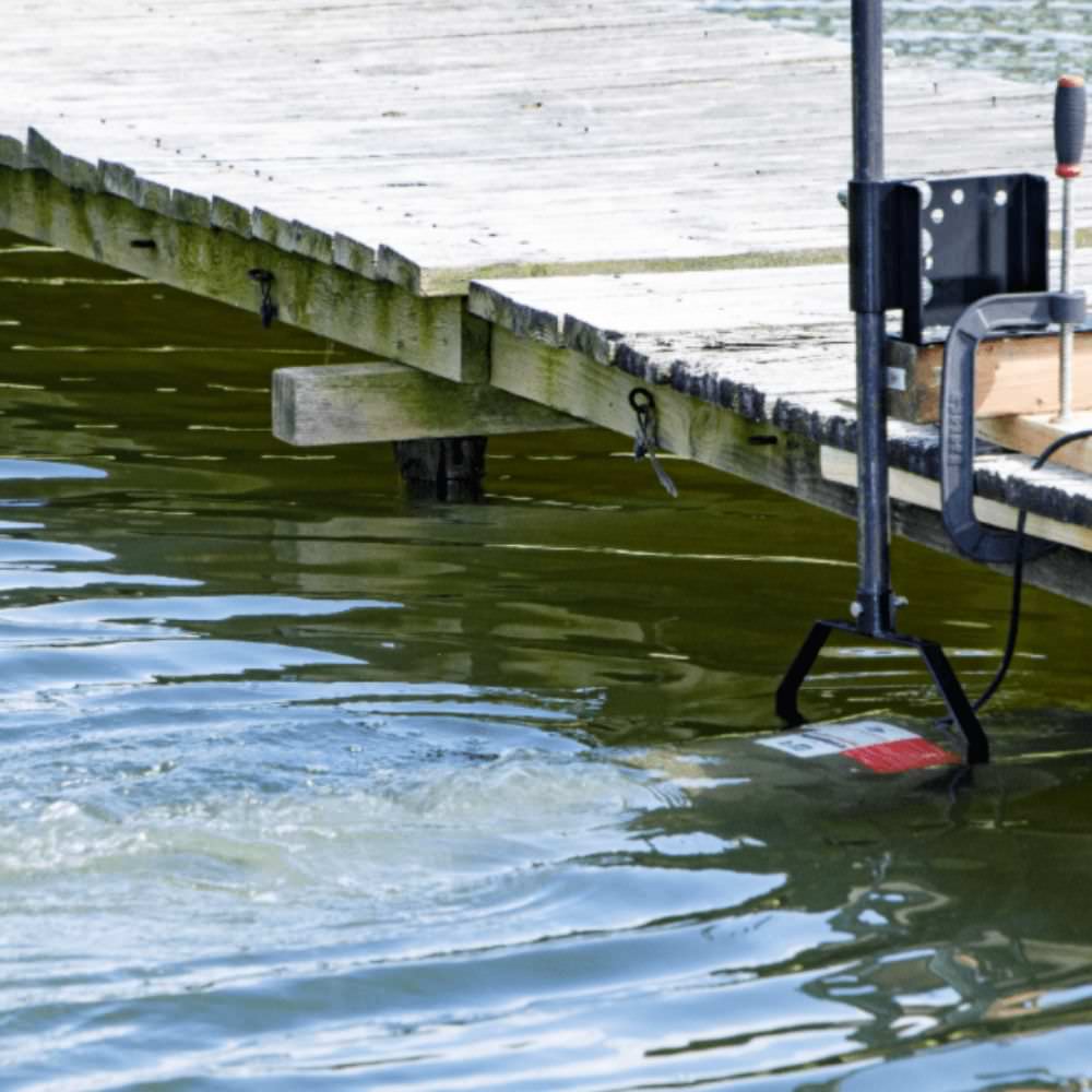 Bearon Aquatic Weeds Away In The Water Attached To A Dock
