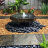 Thumbnail for Bird Bath Basalt Stone Fountain With Wooden Fence And Green Plants Behind