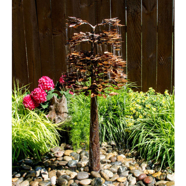 Blue Thumb 40 Copper Sequoia Tree Garden Fountain With Wooden Fence, Hot Pink Flowers And Green Plants Background
