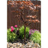 Thumbnail for Blue Thumb 70 Copper Extra Tall Maple Tree Garden Fountain Surrounded By Flowers And Green Plants With Wooden Fence In The Back