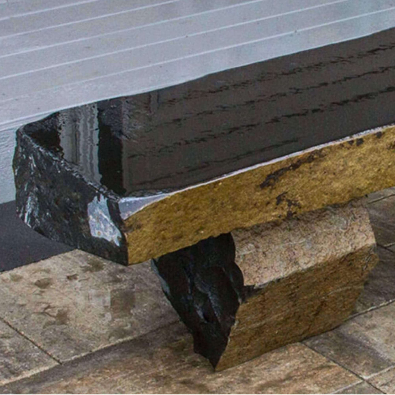 Blue Thumb Basalt 72 Garden Bench Close-up Placed On Brown Tile With Gray Floor