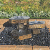 Blue Thumb Bird Bath Triple Stone Fountain With Flowing Water And Plants Behind