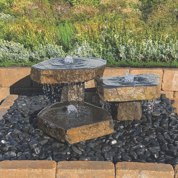 Blue Thumb Bird Bath Triple Stone Fountain With Flowing Water And Plants Behind