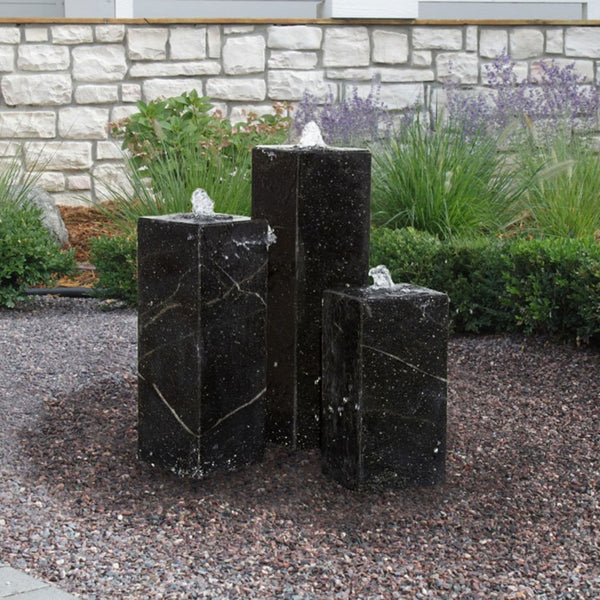 Blue Thumb Black Granite Triple Tower Stone Fountain With Bricks Fence Background