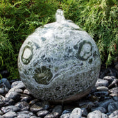Blue Thumb Green Marble Sphere Stone Fountain With Green Plants Behind